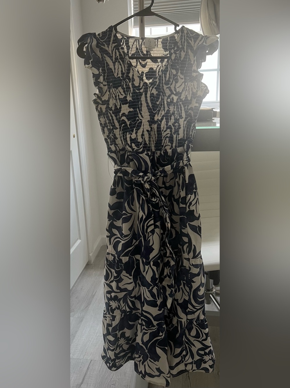 Sleeveless navy blue and off white Floral Midi Dress with Tie Waist